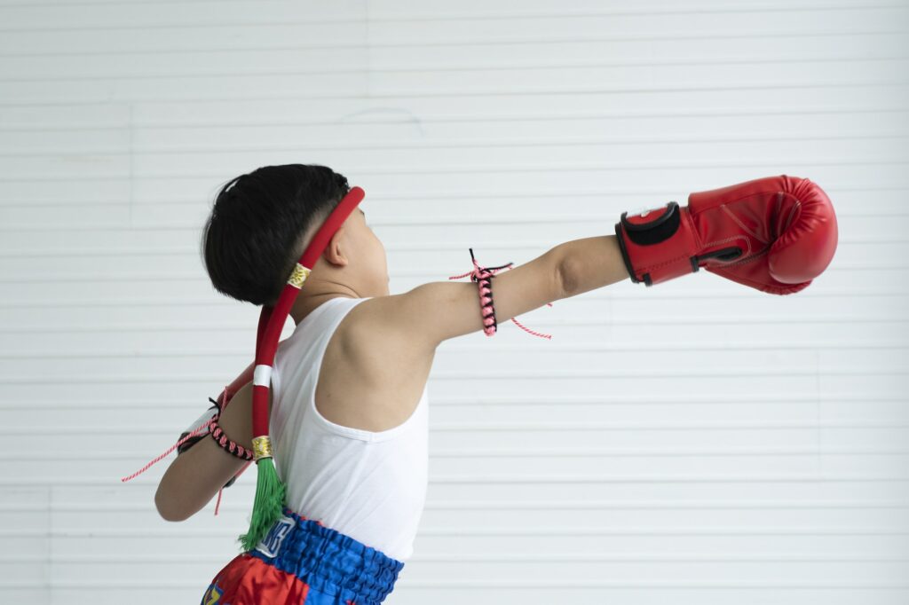 little boys training Muay Thai athlete